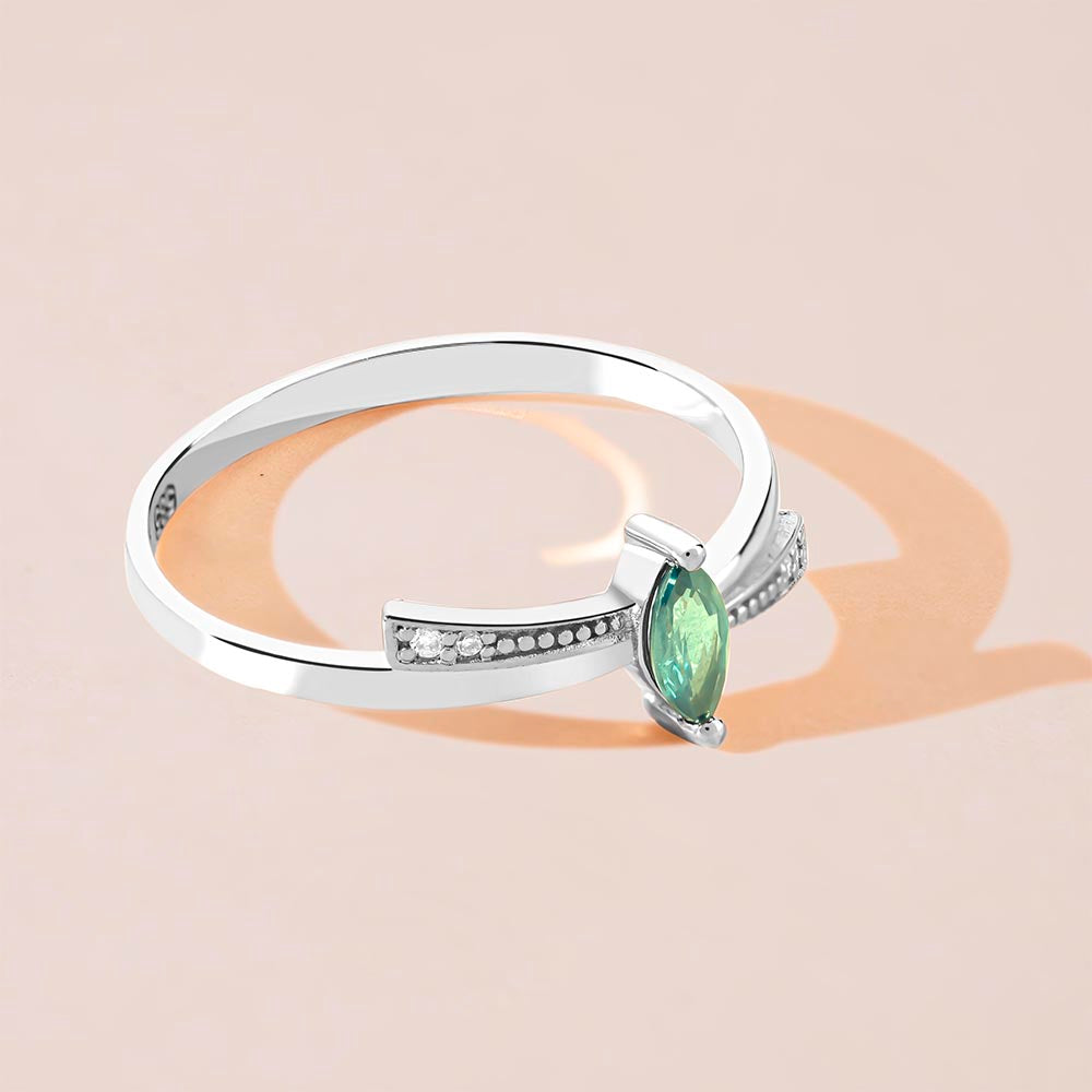 Marquise cut diamond emerald ring