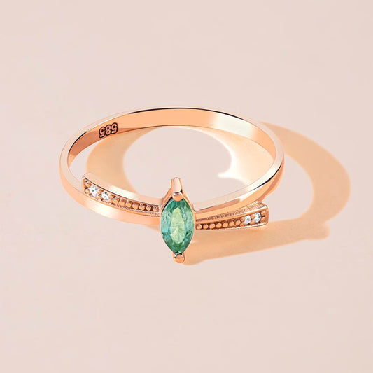Marquise cut diamond emerald ring