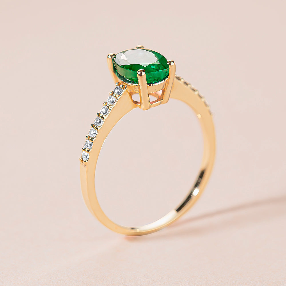 Solitaire emerald ring