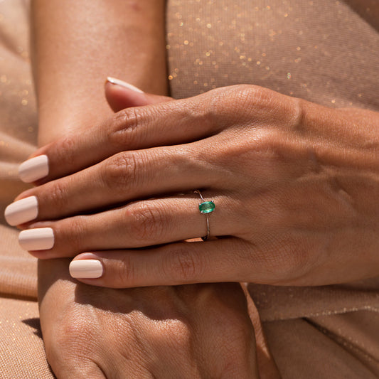 Emerald single stone ring
