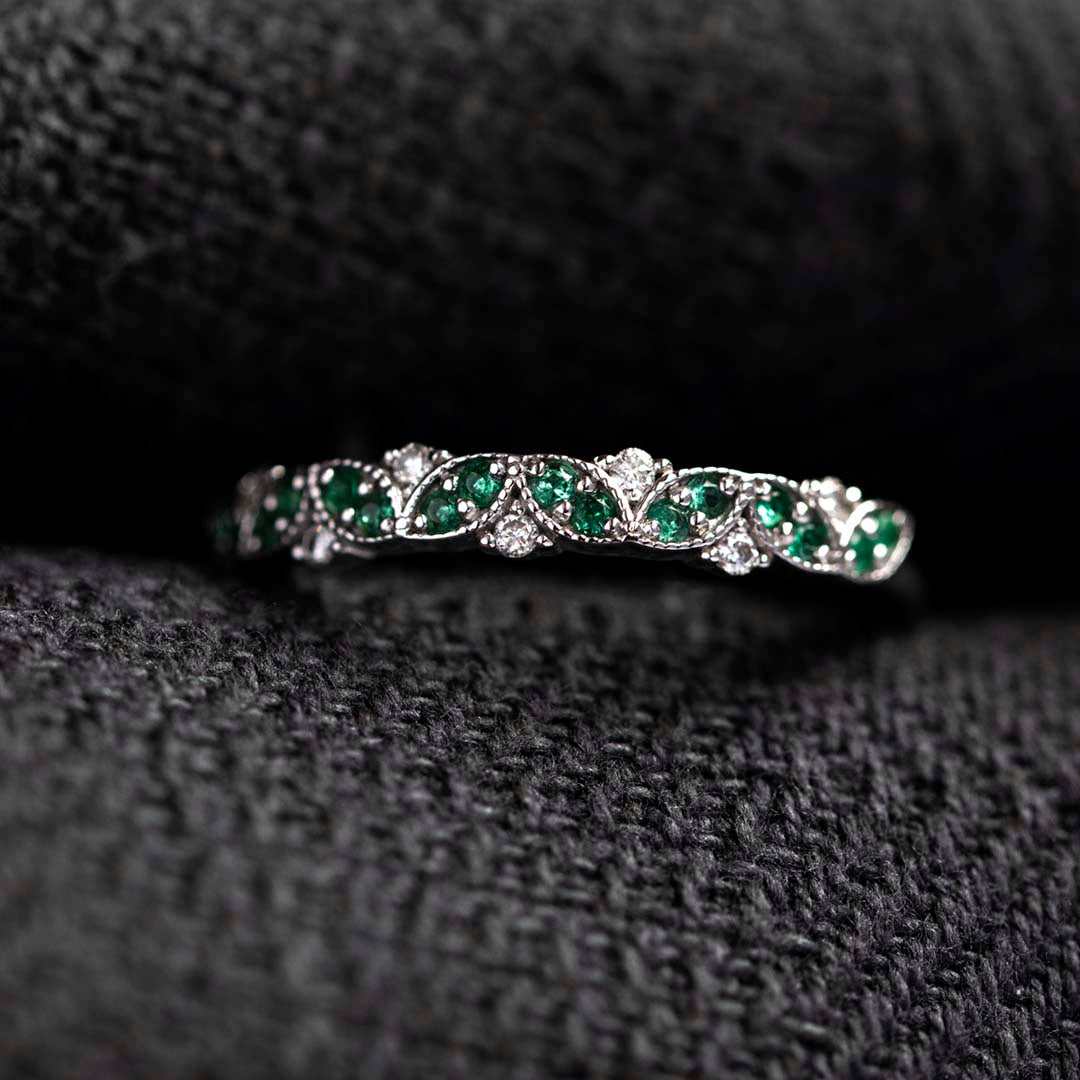 Half round of diamond emerald ring