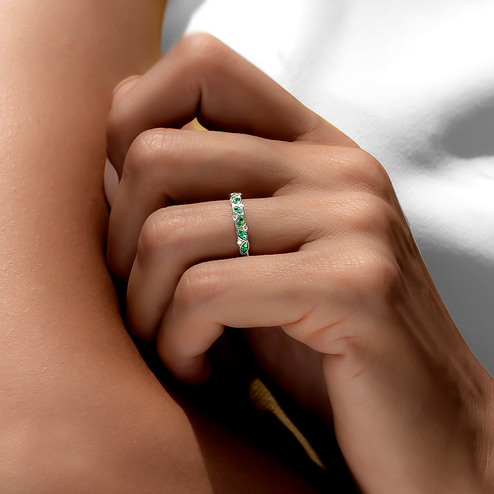 Half round of diamond emerald ring